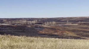 Firefighters tackle hotspots after deadly blaze at Canadian military base