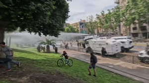 Police use water cannons on Santiago protesters marking 2019 uprising anniversary