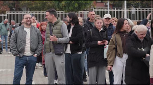 Voters wait in hours-long queues to vote in Serbia's pivotal election