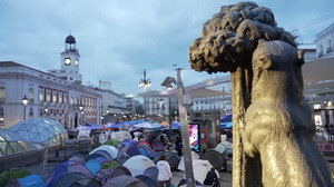 Madrid protesters hail return home for evicted pensioner, demand housing action