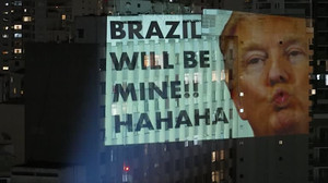 Anonymous Sao Paulo artist projects protest images on buildings ahead of election