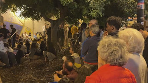 People on Italian island gather to remember victims of 2013 migrant boat disaster