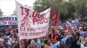 Thousands in Barcelona join housing protest after snap election called