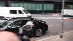 Comedian Russell Brand arrives at London court for pre-trial hearing