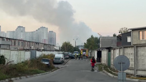 Rescuers work at site where two were killed in Russian missile strike on Kyiv