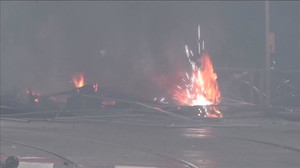 Belgian student protesters damage bus, set fires, in police clashes