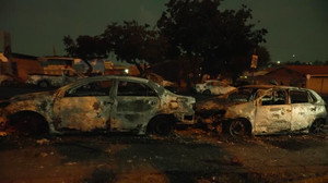 South African anti-migrant protests turn violent, with cars torched, gunshots fired