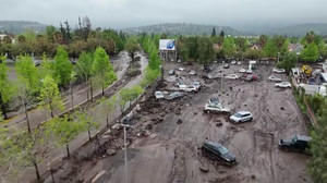 Drone footage shows damage in Santiago neighborhood after flash floods