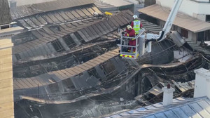 REFILE: Fire destroys French capital's 'Enfants Rouges' covered food market
