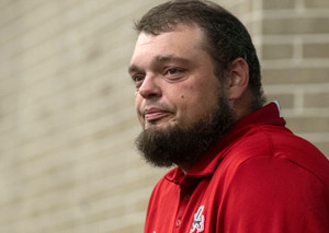 West Florida High School Offensive Line Coach David Gardner holds back tears on Oct. 27, 2026, as he is honored with the USA