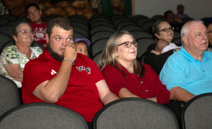 West Florida High School Offensive Line Coach David Gardner holds back tears on Oct. 27, 2026, as he is honored with the USA