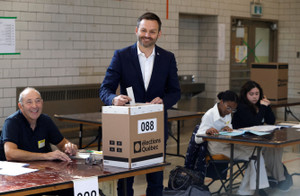 Parti Quebecois (PQ) leader Paul St-Pierre Plamondon casts his ballot in the Quebec provincial election at a polling station in Montreal