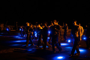 The Wider Image: On the USS George Washington, young sailors adjust to war with Iran