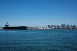 The US Navy Nimitz-class aircraft carrier USS Abraham Lincoln returns home following an extended deployment in the Middle East at Naval Base Coronado in San Diego