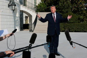 US President Donald Trump departs the White House