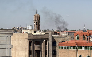 Smoke rises from the site of an airstrike in Sanaa