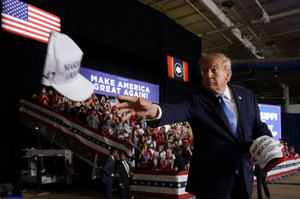 US President Donald Trump attends a midterm election campaign rally at an arena in Corinth