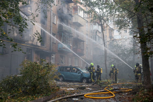 Apartment building damaged during a Russian drone strike, in Kyiv