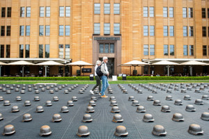 Members of the public interact with sculptures by artist Ai Weiwei, titled ‘Mushrooms’, at the Museum of Contemporary Art Australia in Sydney