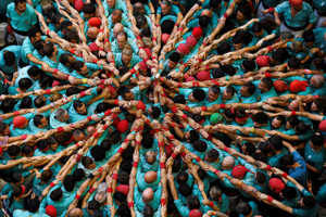 Groups of "Castellers" form a human tower called 'Castell' in Tarragona