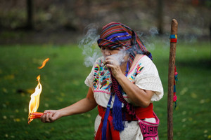 People participate in the Wajxaqi'b Tz'ikin, or Sacred Bird ceremony, at the Casa Blanca archeological site in Chalchuapa