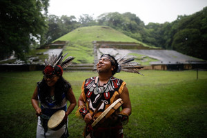 People participate in the Wajxaqi'b Tz'ikin, or Sacred Bird ceremony, at the Casa Blanca archeological site in Chalchuapa