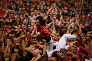 Groups of "Castellers" form a human tower called 'Castell' in Tarragona