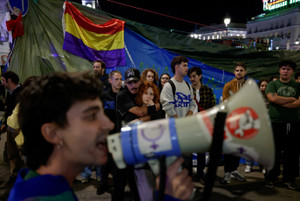 Demonstrators react in Madrid following the death of Maricarmen Abascal, the 87-year-old woman whose eviction sparked housing protests in Spain