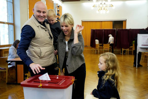 People cast their votes during general election in Riga