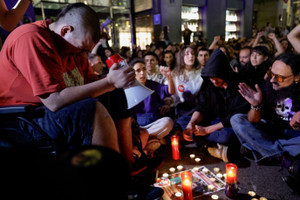 Demonstrators react in Madrid following the death of Maricarmen Abascal, the 87-year-old woman whose eviction sparked housing protests in Spain