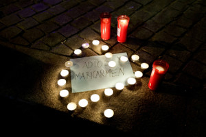 Demonstrators react in Madrid following the death of Maricarmen Abascal, the 87-year-old woman whose eviction sparked housing protests in Spain