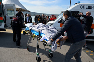 Injured crew member from a ship damaged in a drone attack is seen in Varna
