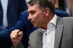 Brazilian presidential candidate Flavio Bolsonaro of the Liberal Party (PL) attends a meeting with members of Brazil's Republicans party to announce the party's support for his campaign, ahead of the runoff election, in Brasilia
