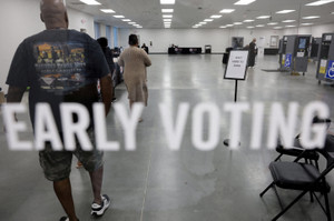 The first day of early voting begins for midterm elections in Georgia