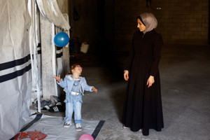 The Wider Image: Evacuated in an incubator, now back in Gaza getting to know mama