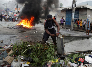 Displaced people protest against living conditions, in Port-au-Prince