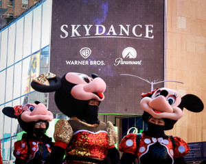 A billboard displaying the logos of Skydance, Warner Bros. and Paramount on the Paramount Global offices in New York