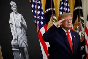 US President Donald Trump hosts a Columbus Day celebration in the East Room of the White House in Washington, D.C.