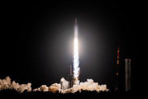 A SpaceX Falcon Heavy rocket lifts off carrying a classified payload for the National Reconnaissance Office, from the Kennedy Space Center