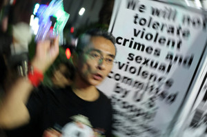 Protest outside Foreign Ministry building following the killing of a Japanese woman in Okinawa, in Tokyo