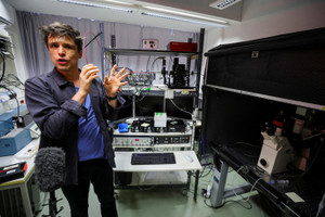 Team members of the Peter Hegemann present research in Hegemann's laboratory after Hegemann, a professor at Humboldt University of Berlin, was awarded the Nobel Prize in medicine, in Berlin